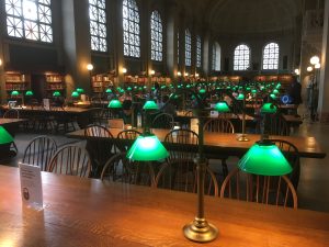 Green glass frosted shades add color and interest to the Boston Public Library reading room tables, on which they are permanently affixed.