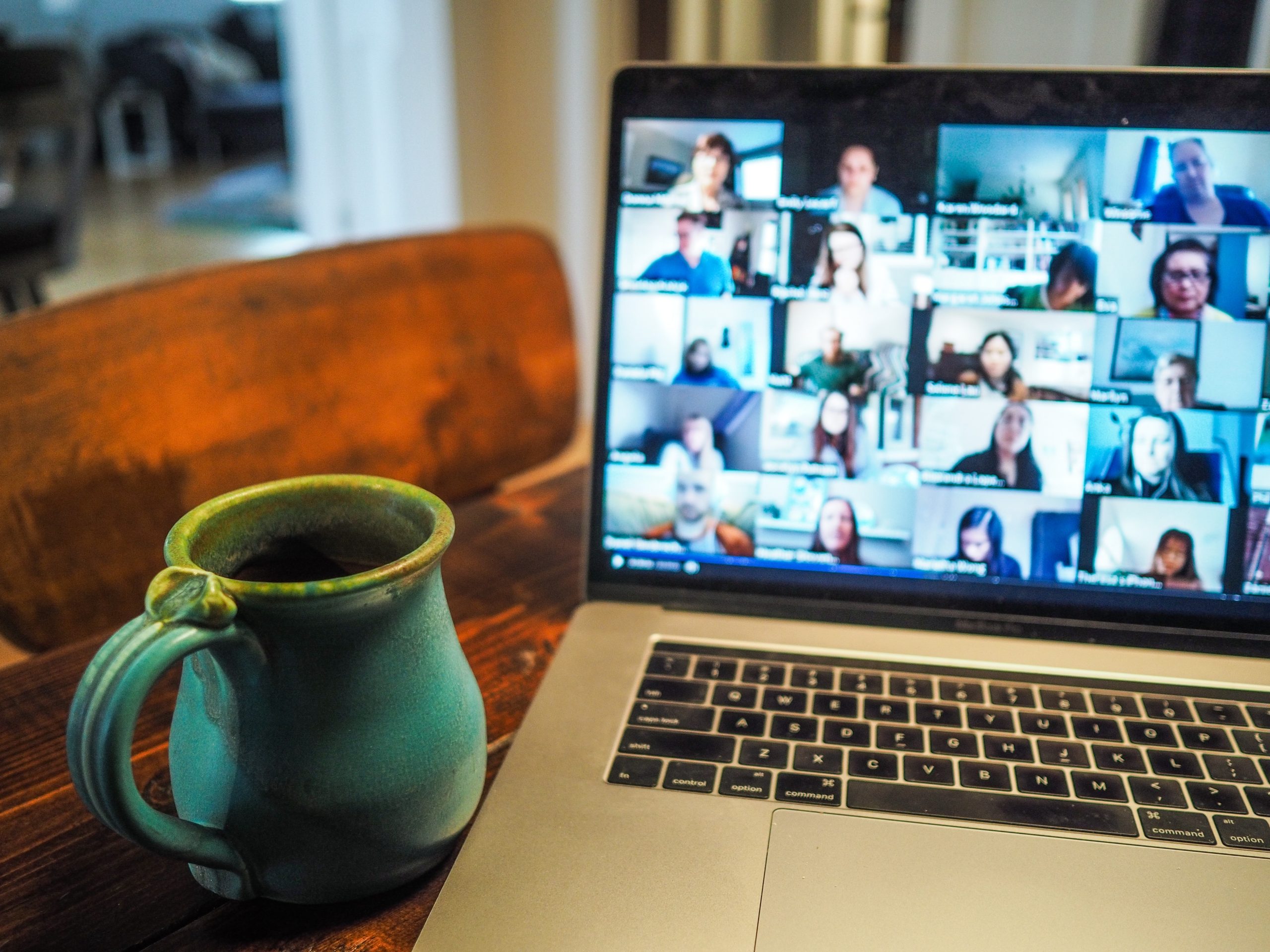 Photograph of a mug and laptop computer